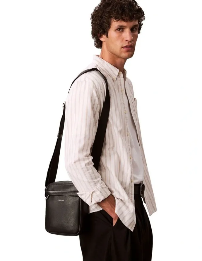 Calvin Klein Micro Pebble Reporter Bag in Black