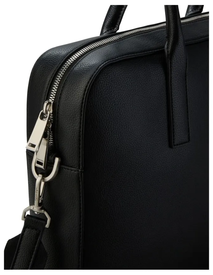Calvin Klein Raised Logo Commuter Bag in Black