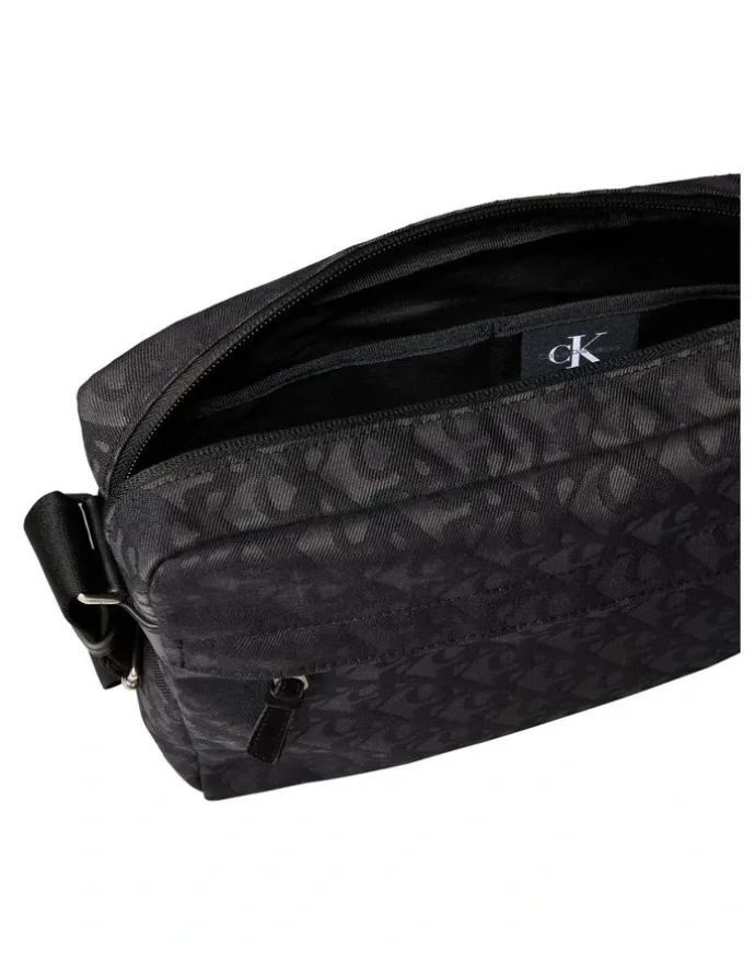 Calvin Klein Unstructured Monogram Flight Bag in Black