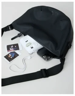 There After Rubberised Crossbody Bag in Black